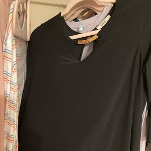 Black blouse with gold cutout